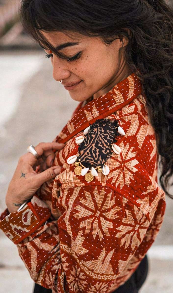 Coat 05, side profile with shell adornment