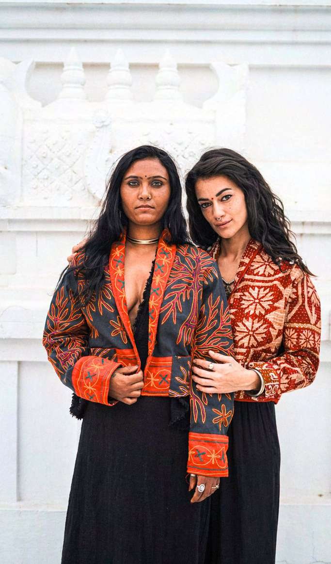Coat 05, worn by two women — now sold